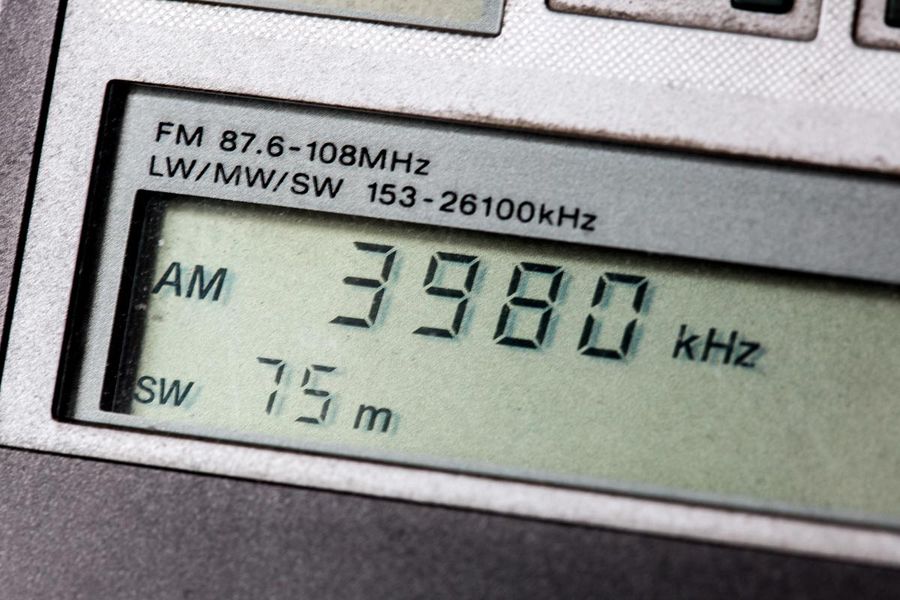 A shortwave receiver. The stations broadcast in the bands this dial covers.