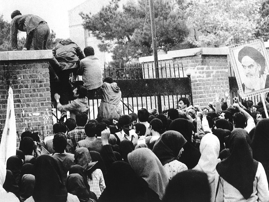 Iran hostage crisis - Iranian students climb up U.S. embassy gates in Tehran