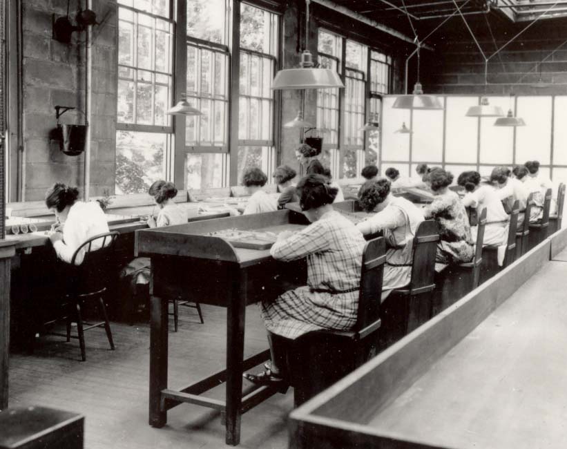 Dial painters at work in 1922, without protection or warning.
