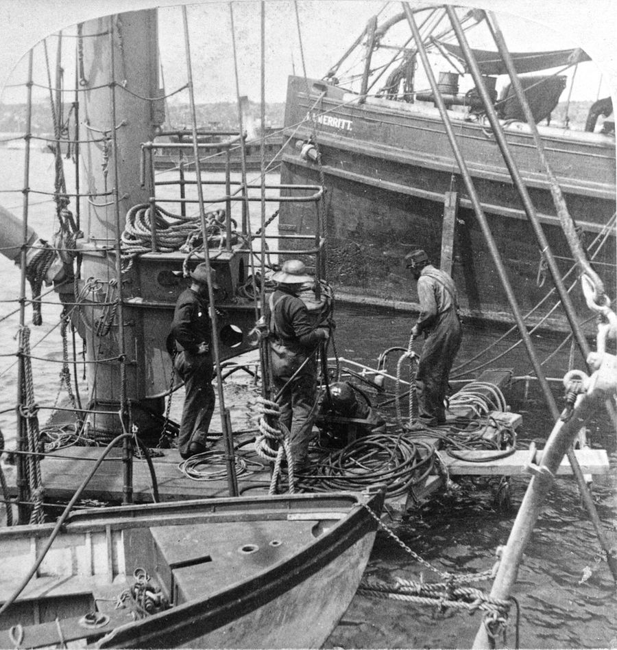 Divers at work on the wreck of the USS Maine in Havana Harbor, Cuba, in February or March of 1898